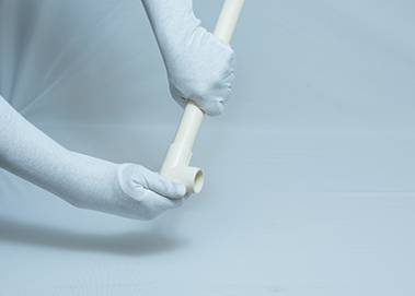 This image depicts a professional joining a CPVC pipe to a CPVC fitting, creating a watertight connection. CPVC Pipes in India have become the preferred choice for hot and cold water systems due to temperature tolerance and longevity. When searching for the best CPVC pipes, consumers prioritise durability and performance. The connection process shown requires precise cutting, chamfering, and application of specialised solvent cement. Leading CPVC pipes manufacturers emphasise quality materials that ensure reliable water delivery. The competitive CPVC pipe price, combined with superior performance, explains why these pipes dominate modern Indian plumbing systems.